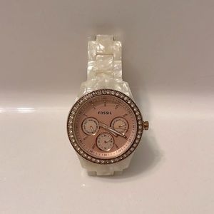 Fossil brand watch with pearl tortoise shell band and rose gold face.